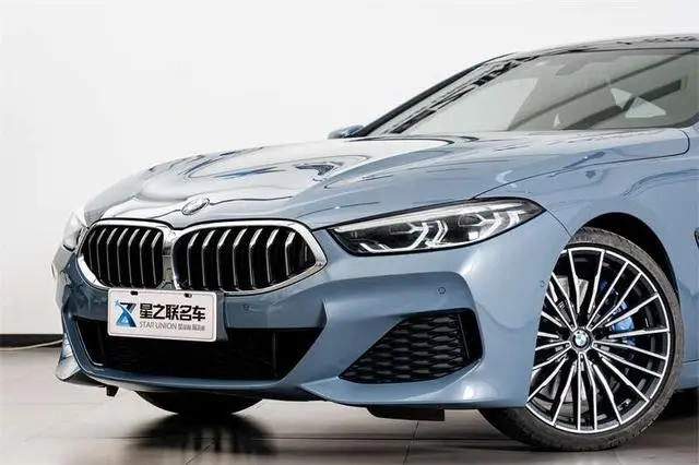 BMW BMW 8 Series 840i four-door coupe M sports suit