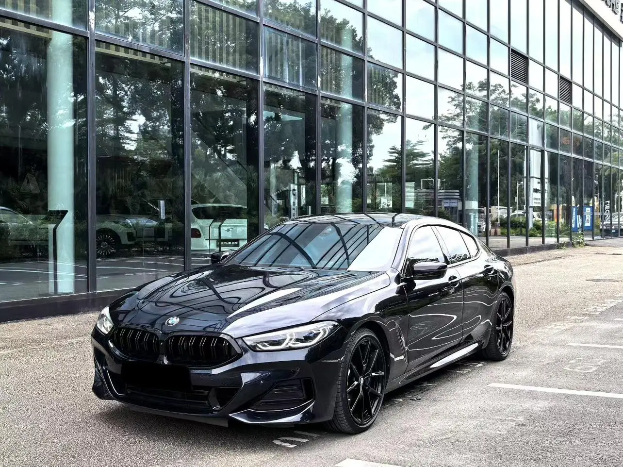 BMW BMW 8 Series 840i xDrive four-door coupe M sports suit