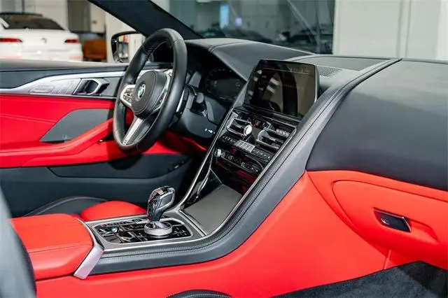 BMW BMW 8 Series 840i four-door coupe M sports suit