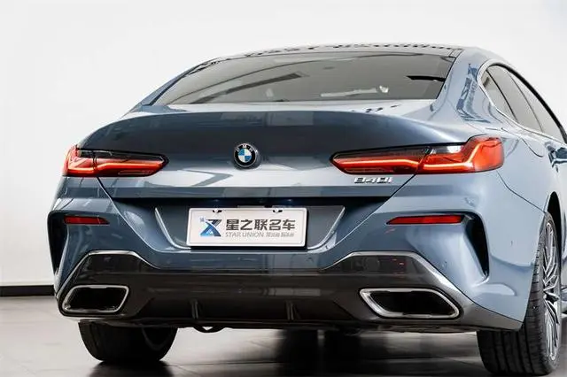 BMW BMW 8 Series 840i four-door coupe M sports suit