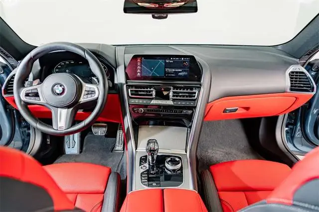 BMW BMW 8 Series 840i four-door coupe M sports suit