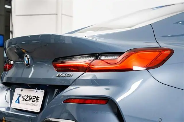 BMW BMW 8 Series 840i four-door coupe M sports suit