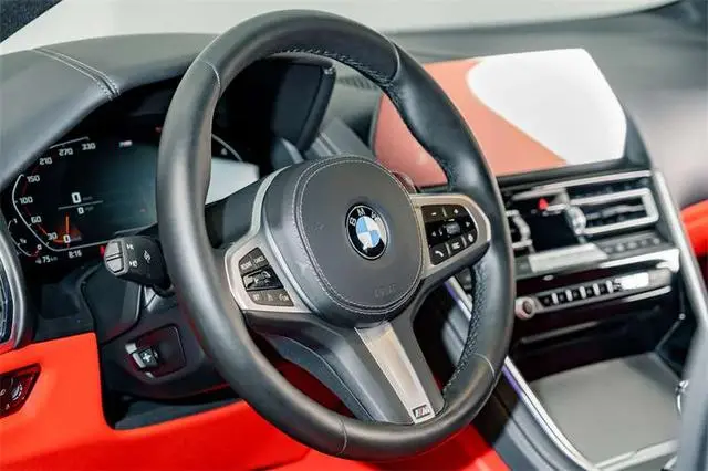 BMW BMW 8 Series 840i four-door coupe M sports suit